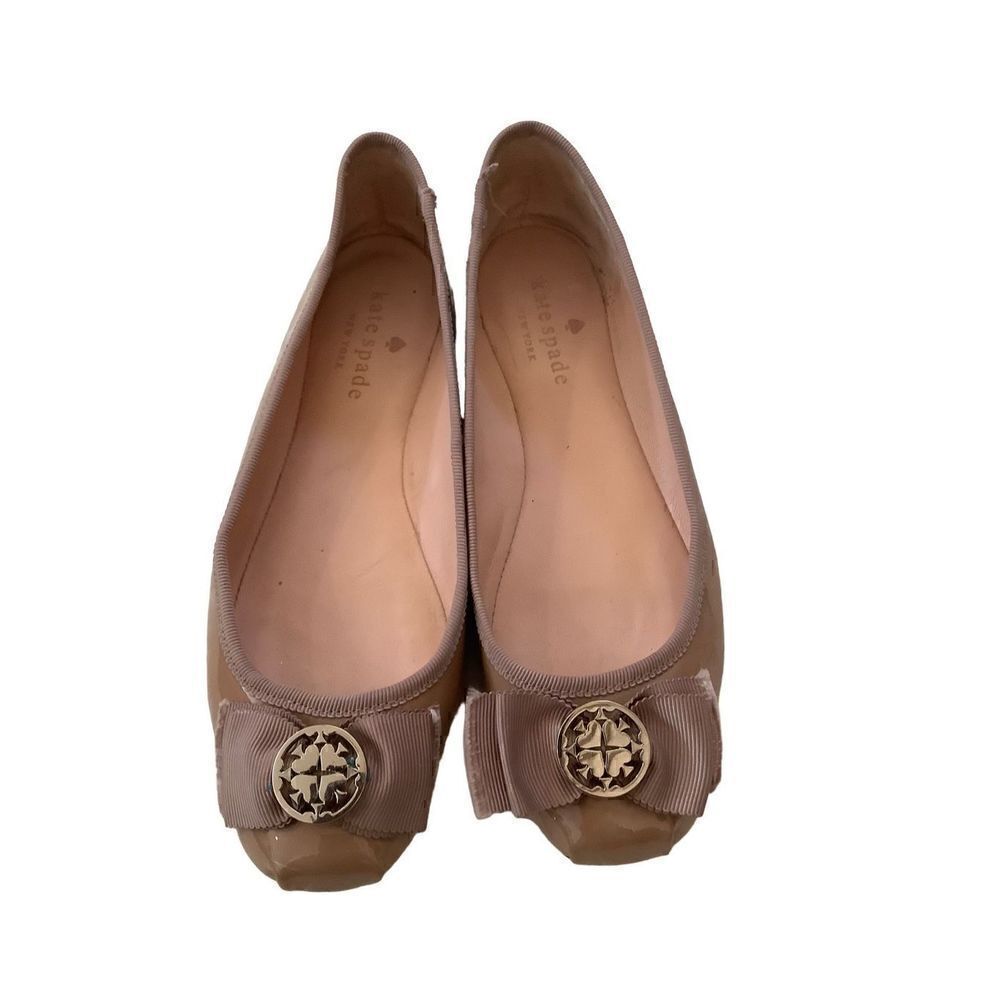 Kate Spade Slip on patent leather bow flats tan with medallion size 6M